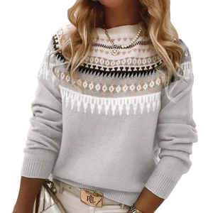 Detailed close-up of Fair Isle knit pattern and ribbed cuffs on women's crewneck sweater