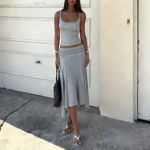 Chic grey knit two-piece set featuring slim-fit tank top and ruffled midi fishtail skirt