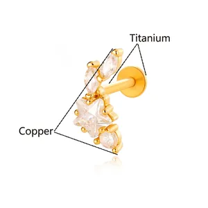 Titanium labret stud with gold plated copper star and zircon crystals for ear piercing