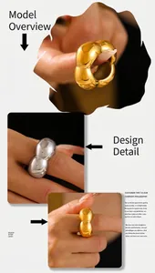Detail of chunky gold and silver hollow flower rings with high-polished puffy metallic finish