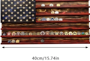 Macro detail of burnt wood finish on flag-themed coin display rack measuring 40cm