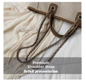 Detail presentation of premium leather handles and woven texture on a large tote bag