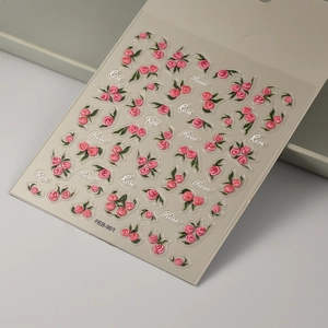 Close-up of 5D embossed rose nail stickers with pink flowers and Rose text, style FEB-901
