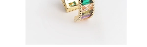 Macro shot of colorful rectangular crystals and beaded gold edge on adjustable ring
