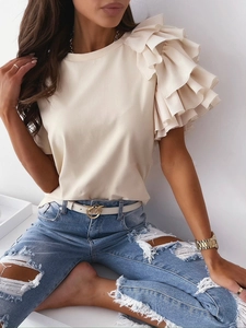 Detail of elegant ruffle sleeves on an off-white round neck t-shirt for women