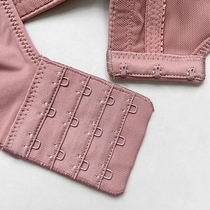 Pink push-up bra back view with 4-row 3-hook closure and breathable mesh fabric