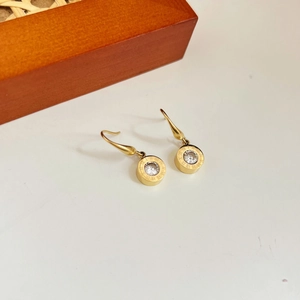 Goldene Edelstahl-Ohrringe mit römischen Ziffern und zentralem klarem Zirkonia-Stein