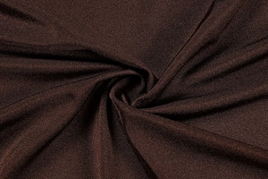 Gros plan macro de la texture du tissu tricoté marron foncé avec tissage vertical et mat
