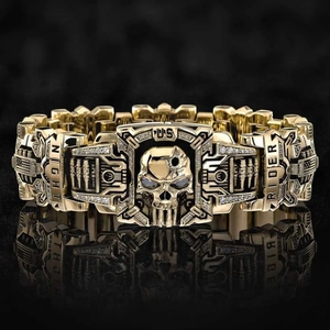 Detailed view of punk mechanical skull bracelet with US Night Rider text and reflections