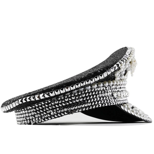 Detailed side view of military party hat with silver studs and white pearl embellishments