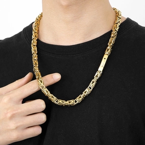 Men's gold woven Byzantine chain necklace in stainless steel worn on neck model