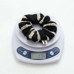 French vintage striped tweed scrunchie displayed on a scale showing 17.4g weight