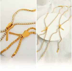 Detail of gold-plated zipper necklace featuring shimmering cubic zirconia inlay accents