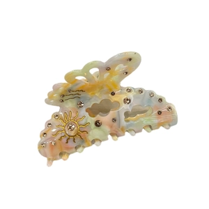 Pince à cheveux papillon en acétate avec strass et motif de nuages colorés en résine