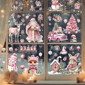 Pink Christmas window stickers featuring Santa, reindeer, and snowman in a snowy scene