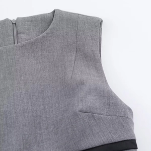 Detail of grey sleeveless mini dress with round neck and back zipper closure texture