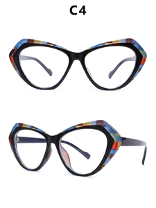 Detail of cat-eye eyewear frames with colorful abstract stripes and floral patterns