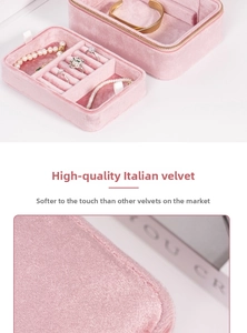 Macro shot of soft pink velvet fabric texture and jewelry compartments with metal zipper