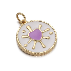 Macro view of gold sunburst pendant with a purple heart and white enamel details