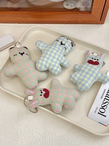 Cute plaid stuffed bear and rabbit plush keychain set with metal bead chains in a tray