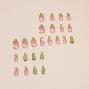 Almond shaped press-on nails with green pink gradient and white daisy floral patterns