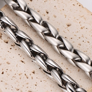 Vintage braided stainless steel bracelet with polished and matte textured finishes