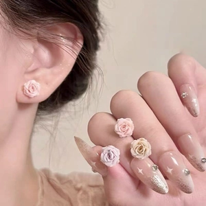 Elegant 3D resin rose stud earrings set in soft pink, white and purple floral designs