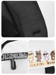 Detail view of thickened breathable mesh shoulder straps and cute cartoon bear prints