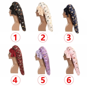 Six colors of long satin bonnets featuring butterfly prints displayed on mannequins