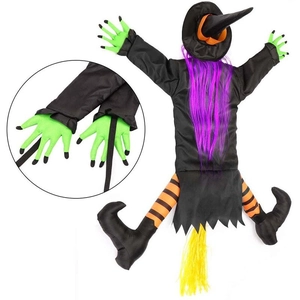 Halloween crashing witch tree decoration with purple hair and orange striped legs