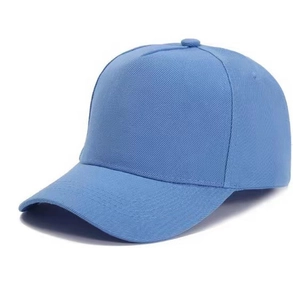 Close-up of light blue baseball cap showing detailed cotton twill fabric texture and stitching