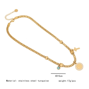 Detail showing gold stainless steel cross necklace with turquoise pendant and size markers