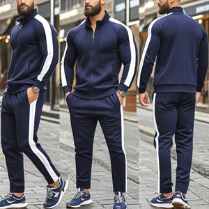 Detailed three-way view of navy track jacket and pants with white side stripes