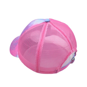Close-up of pink breathable mesh back and adjustable metal buckle on a tie-dye cap
