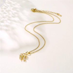 18K gold leaf necklace with white zircon pendants on a minimalist O-chain necklace