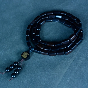 Handcrafted dark sandalwood buddhist prayer bead bracelet with golden character