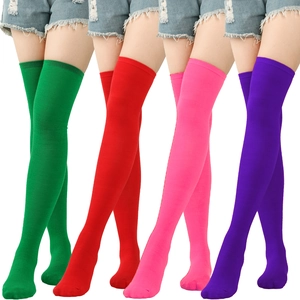 Over-the-knee Christmas stockings in red, green, pink, and purple colors for women
