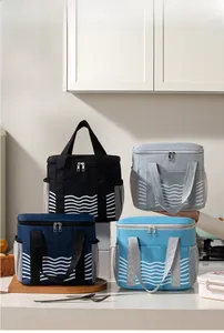 Insulated lunch bags in four colors featuring wavy patterns and side mesh pockets