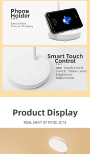 Detail view of white LED desk lamp base with phone holder and smart touch control button