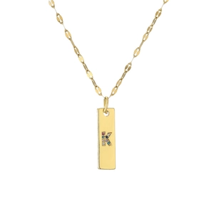 Detail of gold-plated rectangle pendant necklace with colorful crystal letter K charm