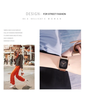 Detail showing brown leather strap on square quartz watch with a minimalist daily look