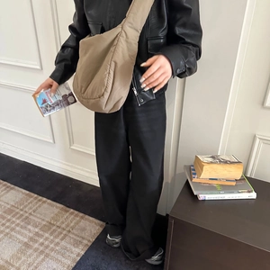 Khaki large capacity sponge tote bag in soft fabric styled with model's chic outfit