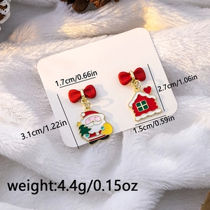 Detailed view of asymmetric Santa and red house Christmas earrings with size dimensions