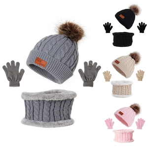 Toddler winter set featuring a pompom beanie hat, thick neck warmer, and full-finger gloves