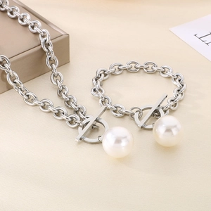 Detailed set of silver chain necklace and bracelet with large pearls and OT toggle clasps