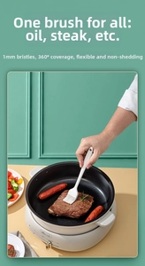 Detailed view of white silicone pastry brush with flexible bristles for cooking and baking