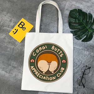 Detail of canvas tote bag featuring Corgi Butts Appreciation Club cartoon print