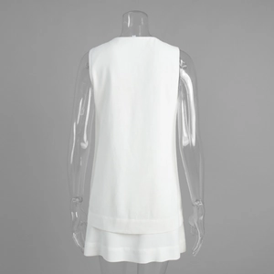 Back view of white sleeveless vest and A-line skirt set on transparent mannequin
