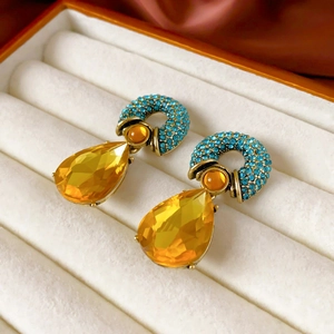 Vintage gold drop earrings with blue rhinestones and large yellow water drop crystals