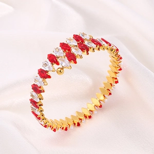 Luxurious gold titanium steel cuff bracelet with red and white marquise zircons on silk